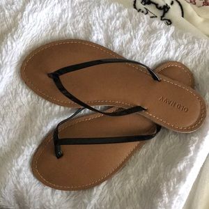Black thong flip flops